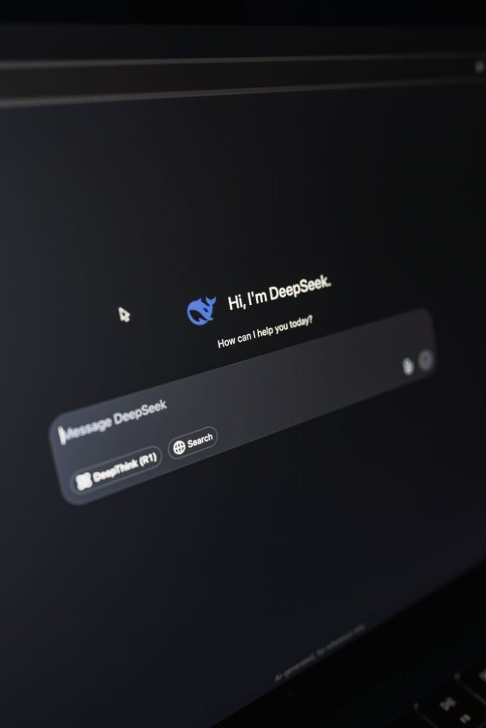 The Art of Drawing Readers In: Your attractive post title goes here Close-up of a laptop displaying an AI interface with a chatbot prompt in dark mode.